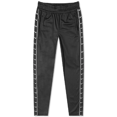 Nike Taped Poly Track Pant In Black | ModeSens