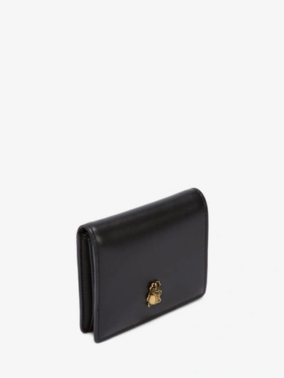 Shop Alexander Mcqueen Insect Folded Wallet In Black