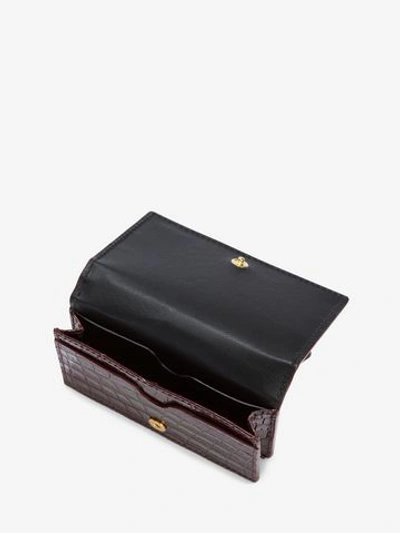 Shop Alexander Mcqueen Skull Folded Card Holder In Velvet Red