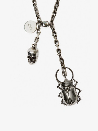 Shop Alexander Mcqueen Beetle And Skull Necklace In Antique Silver