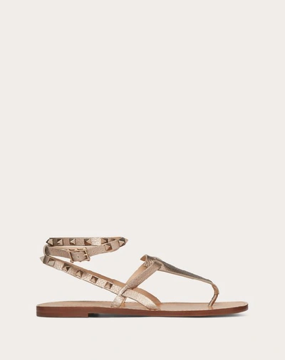 Shop Valentino Garavani Rockstud Double Laminated Grainy Calfskin Flat Flip-flop Sandal In Champagne