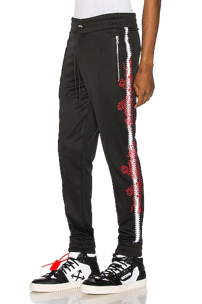 Shop Amiri Souvenir Track Jogger In Black In Tar