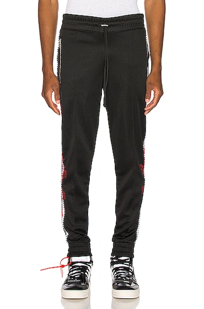 Shop Amiri Souvenir Track Jogger In Black In Tar