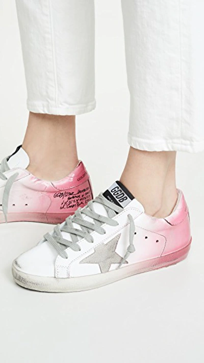 Shop Golden Goose Superstar Sneakers In White/pink