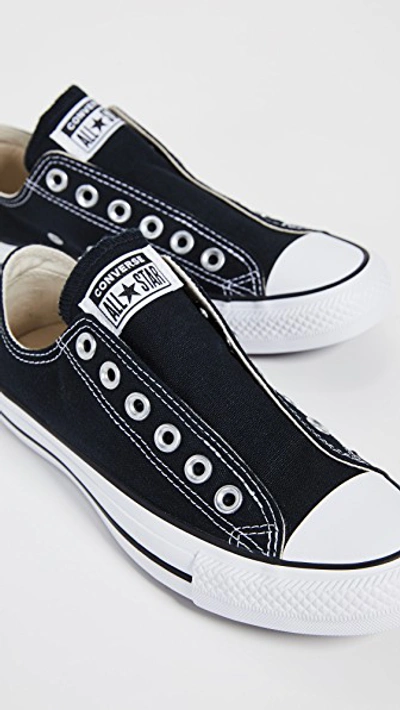 Shop Converse Chuck Taylor All Star Slip On Sneakers In Black/white