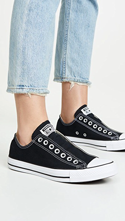 Shop Converse Chuck Taylor All Star Slip On Sneakers In Black/white