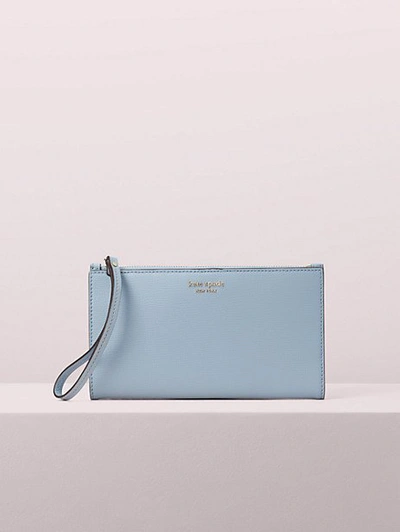 Shop Kate Spade Sylvia Large Continental Wristlet In Horizon Blue