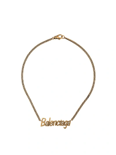 Shop Balenciaga Typo Necklace In Antique Gold