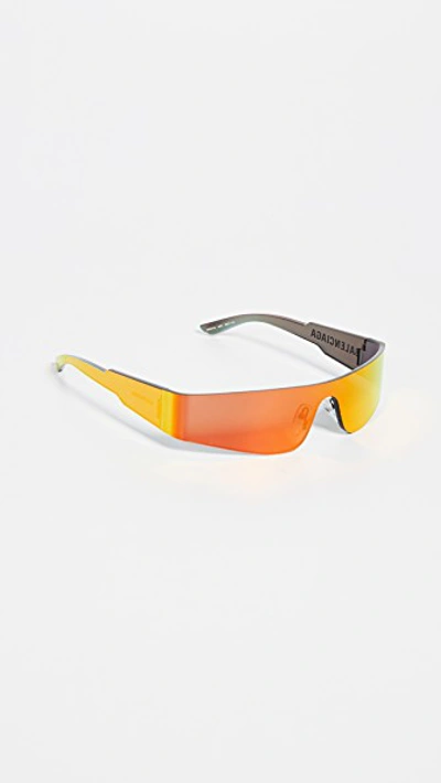 Shop Balenciaga Mono Futuristic Sunglasses In Solid Grey With Mirrored Orang