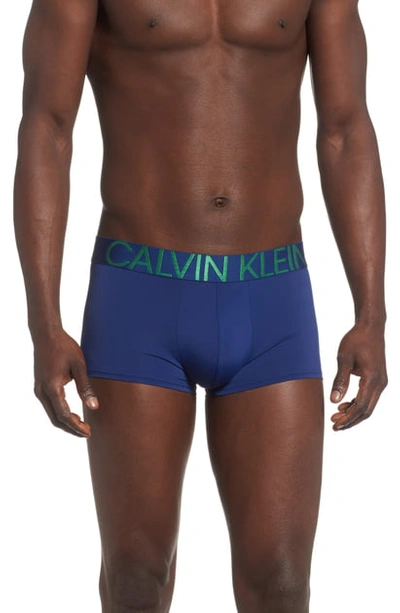 Shop Calvin Klein Low Rise Trunks In Blue Depth W/ Pine Green Logo