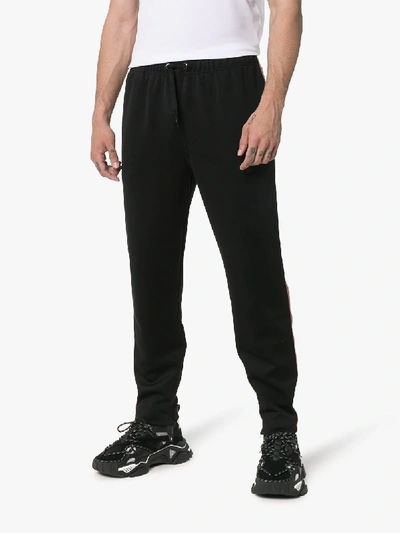 Shop Burberry Icon Stripe Detail Jersey Trackpants In 1002 Black