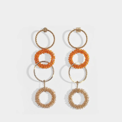 Shop Jacquemus | Les Boucles Riviera Earrings In Brass And Orange Swarovski Crystals