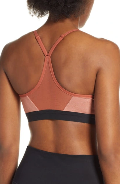 Shop Nike Indy Sports Bra In Dusty Peach/ Pure/ Black