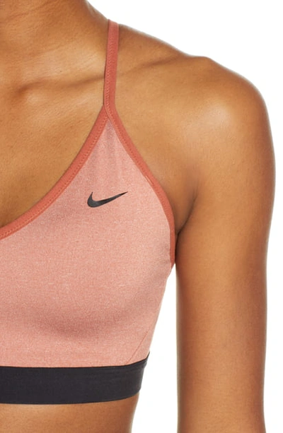 Shop Nike Indy Sports Bra In Dusty Peach/ Pure/ Black