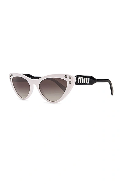 Shop Miu Miu Embellished Cat Eye Sunglasses In White