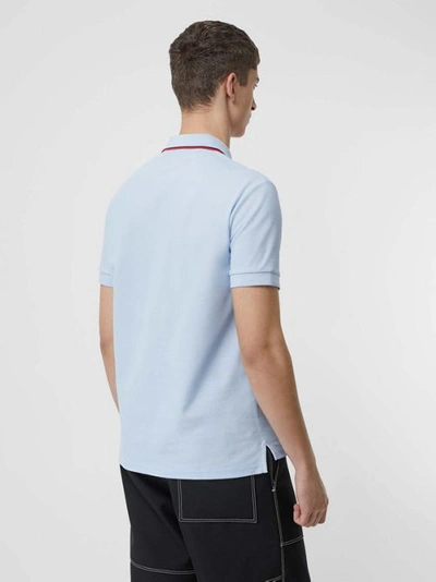 Shop Burberry Icon Stripe Placket Cotton Piqué Polo Shirt In Pale Blue