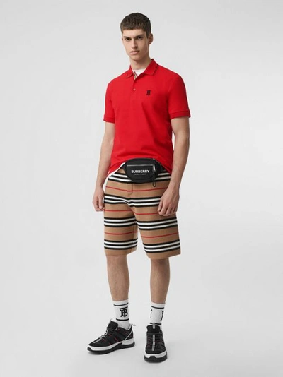 Shop Burberry Icon Stripe Placket Cotton Piqué Polo Shirt In Bright Red