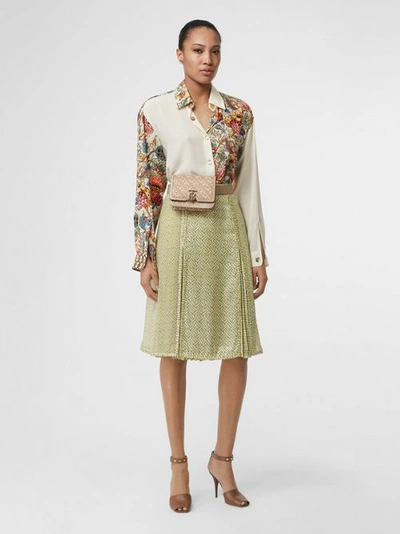 Shop Burberry Monogram Print Silk Pleated Skirt In Pale Yellow