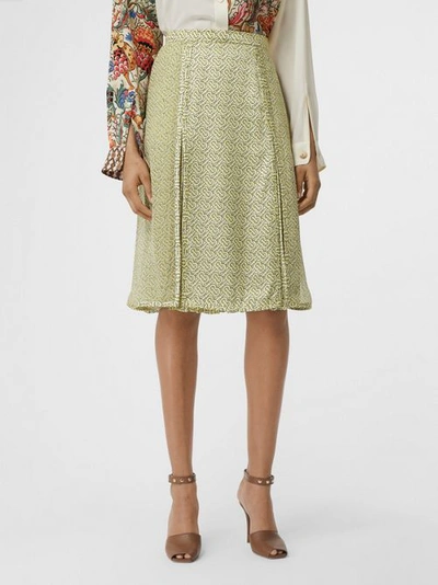 Shop Burberry Monogram Print Silk Pleated Skirt In Pale Yellow