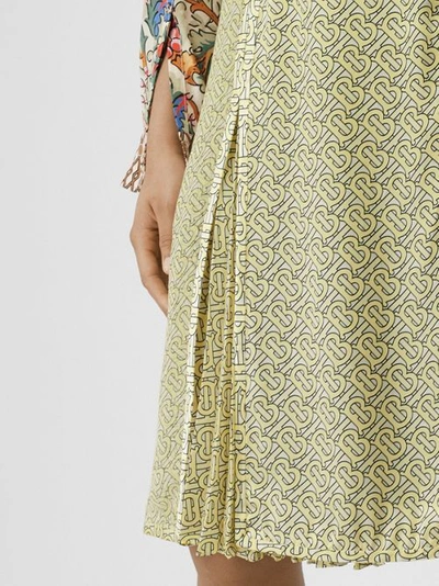 Shop Burberry Monogram Print Silk Pleated Skirt In Pale Yellow