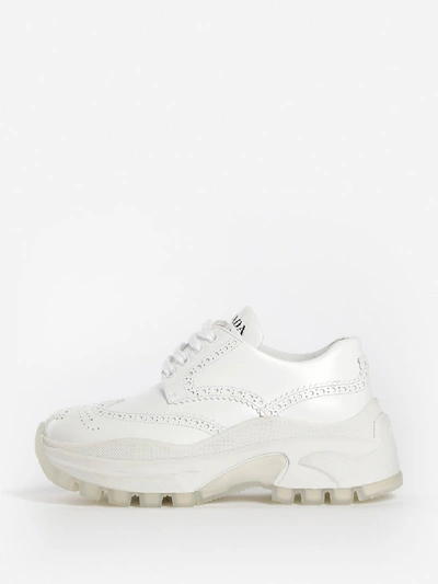 Shop Prada Sneakers In White