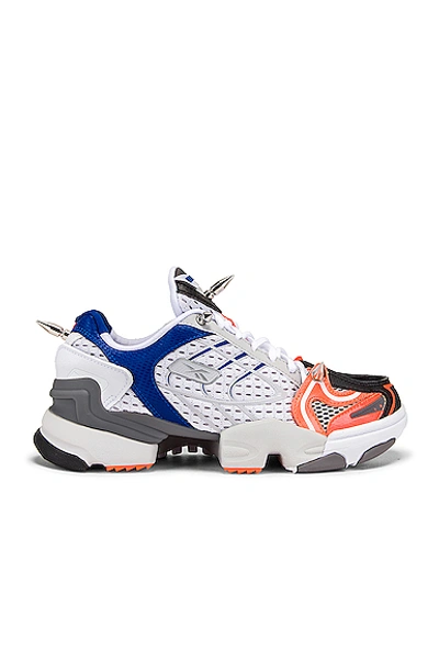 Shop Vetements Spike Runner 400 Sneakers In White In Fluo Orange