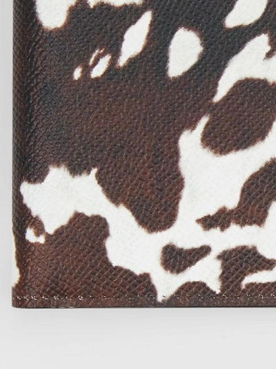 Shop Burberry Cow Print Leather International Bifold Wallet In Black/white