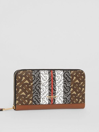 Shop Burberry Monogram Stripe E-canvas And Leather Ziparound Wallet In Bridle Brown