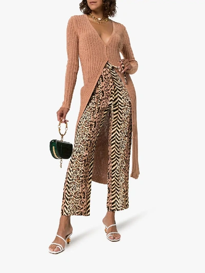 Shop Nanushka Luma Animal Print Trousers In Brown