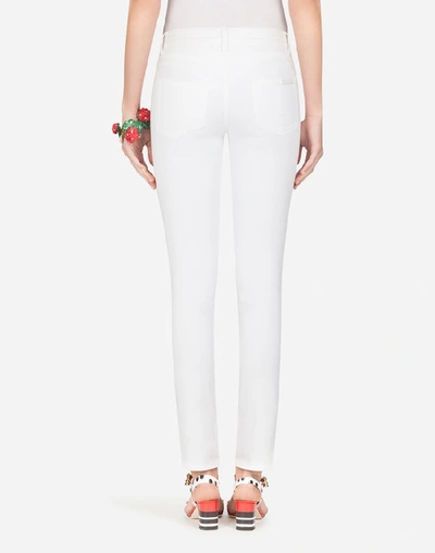 Shop Dolce & Gabbana Girly Fit Jeans With Embroidery In White