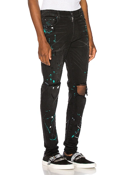 Shop Amiri Paint Splatter Jean In Black In Aged Black