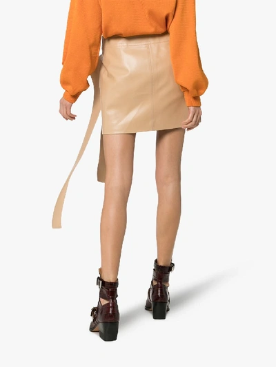 Shop Jw Anderson Toast Leather Tab Mini Skirt In Neutrals