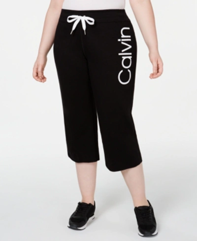Shop Calvin Klein Performance Plus Size Logo Flared Cropped Pants In Black