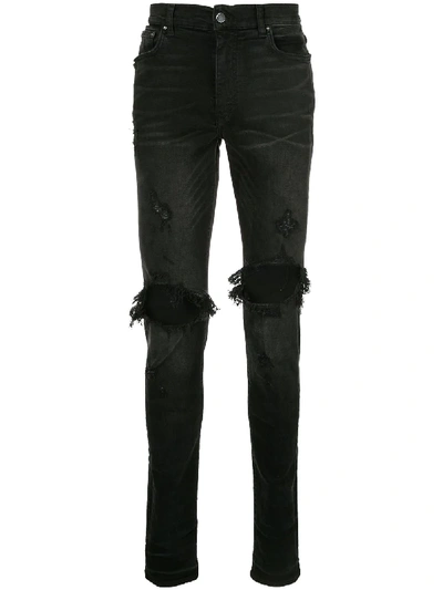Shop Amiri Thrasher Slim-fit Jeans - Black