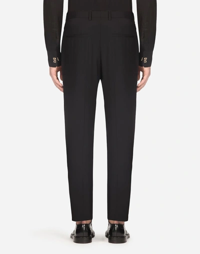 Shop Dolce & Gabbana Stretch Wool Pants With Patch In Black