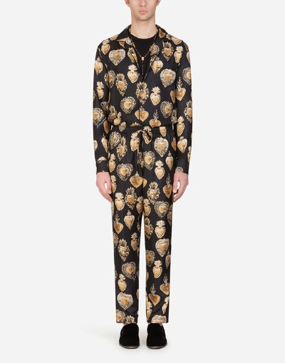 Shop Dolce & Gabbana Silk Pajama Pants With Sacred Heart Print In Black