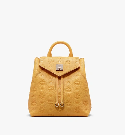 Shop Mcm Essential Backpack In Monogram Leather In Golden Mango