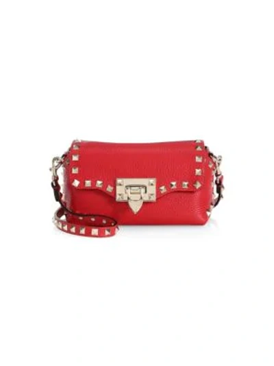 Shop Valentino Mini Rockstud Leather Crossbody Bag In Deep Red