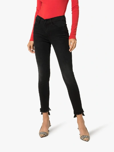 Shop Frame Le High Skinny Raw Stagger Jeans In Black