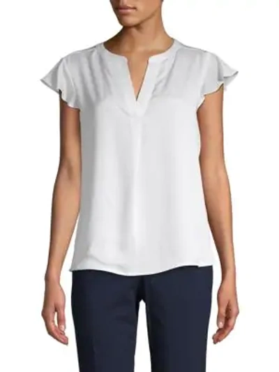 Shop Calvin Klein Petite Dotted Cap-sleeve Top In White