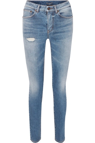 Shop Saint Laurent Distressed Low-rise Skinny Jeans In Blue