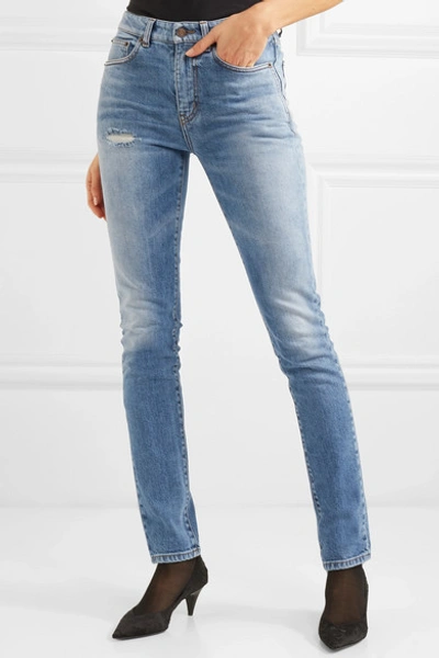 Shop Saint Laurent Distressed Low-rise Skinny Jeans In Blue