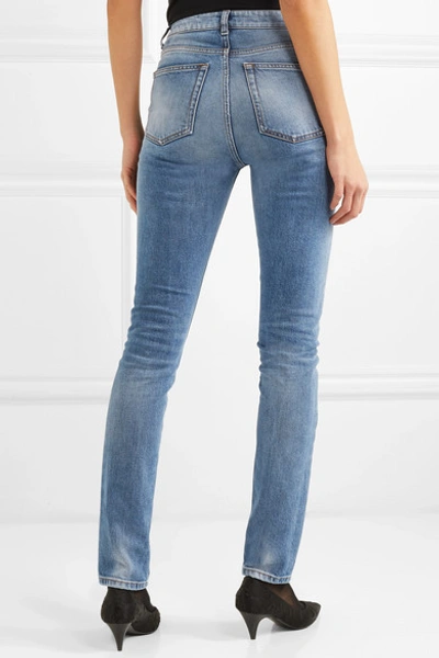 Shop Saint Laurent Distressed Low-rise Skinny Jeans In Blue