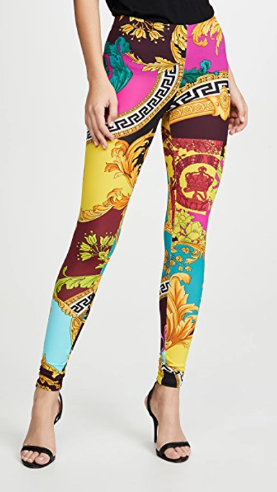 Shop Versace Printed Leggings In Multi