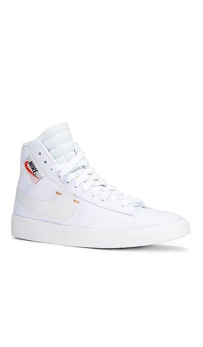 Shop Nike Women's Blazer Mid Rebel Sneaker In White & Orange
