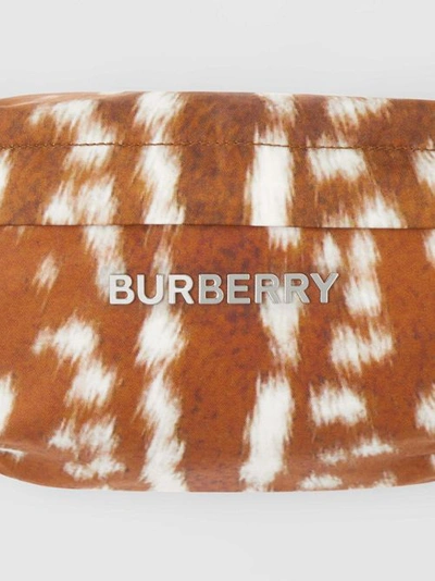 Shop Burberry Medium Deer Print Bum Bag In 탠/화이트
