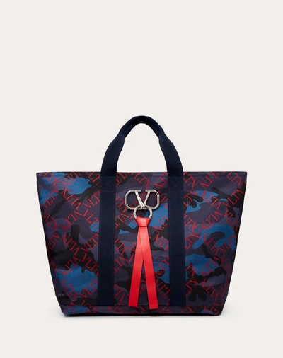 Shop Valentino Garavani Uomo Large Nylon Vltn Grid Camouflage Tote In Navy/ Red