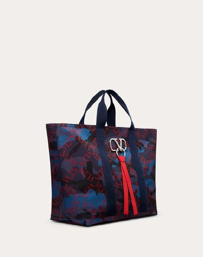 Shop Valentino Garavani Uomo Large Nylon Vltn Grid Camouflage Tote In Navy/ Red