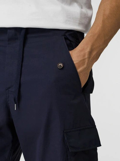 Shop Burberry Cotton Tapered Cargo Trousers In Navy