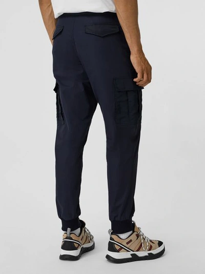 Shop Burberry Cotton Tapered Cargo Trousers In Navy
